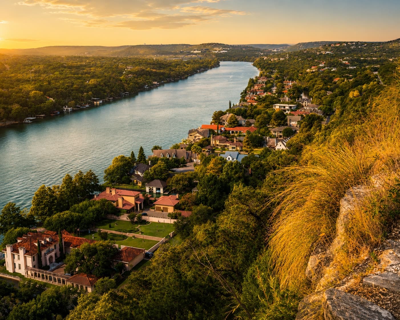 Lake Austin waterfront estates along the wooded shore below Mount Bonnell at sunset, Tarrytown, Austin